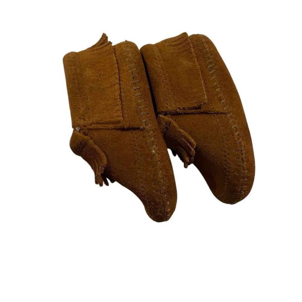 Minnetonka Tan  Moccasins with Fringe size 4